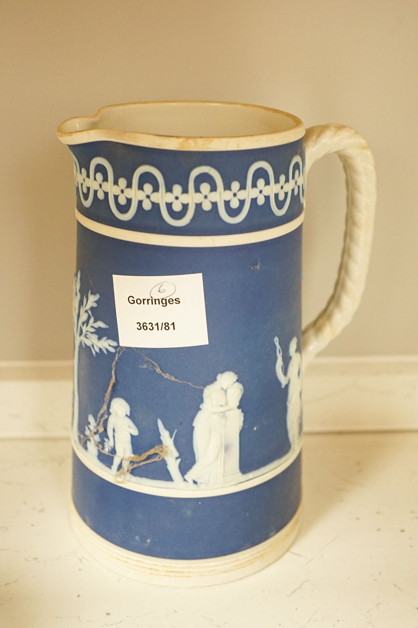 Five Victorian stoneware jugs and a blue jasper jug (6) 21cm